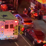 EMS at scene of Lower Manhattan robbery where woman was shot dead